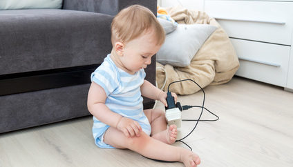 baby playing with electrical wires | Importance of Safety switches and household electrical safety